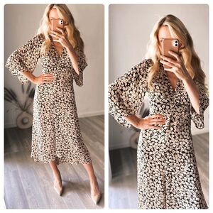 PRINTED DRESS WITH DRAPING NEW